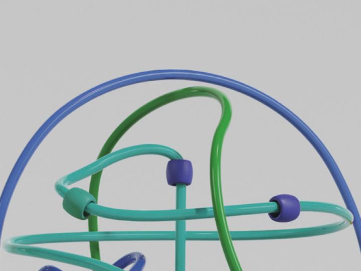 Ein Kinderspielzeug aus Draht mit Kugeln zu einem Kopf geformt